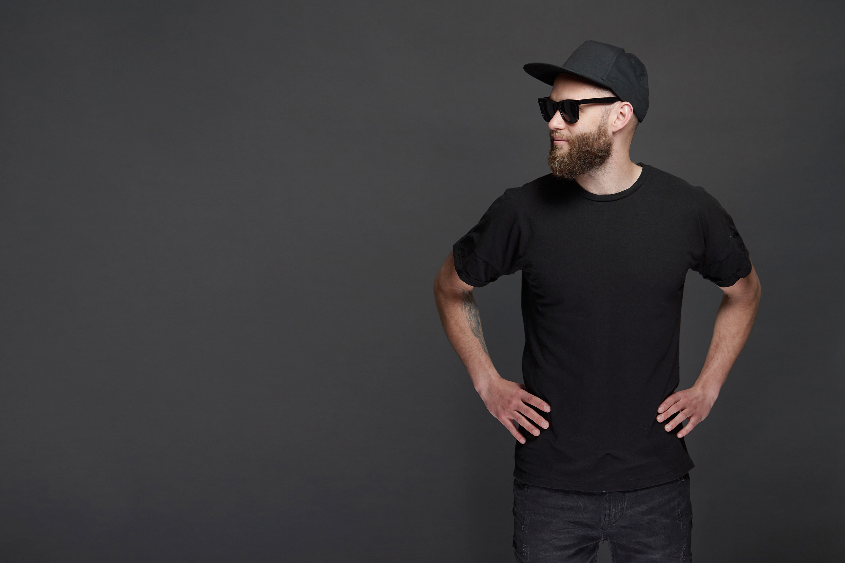 Man in Shirt with Cap and Sunglasses